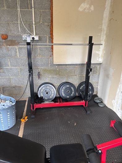 Adjustable squat and bench rack