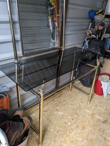 Brass dressing table and mirror.