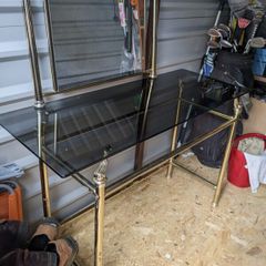 Brass dressing table and mirror.