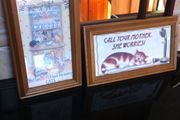 Two lovely wooden framed pictures of cats