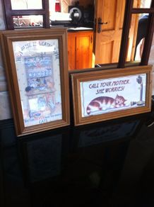 Two lovely wooden framed pictures of cats