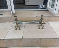 Brass fire dogs and fire set