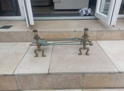 Brass fire dogs and fire set