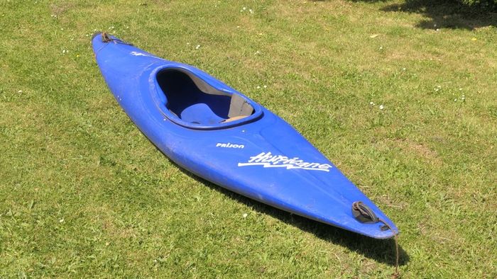 Canoe with Paddle