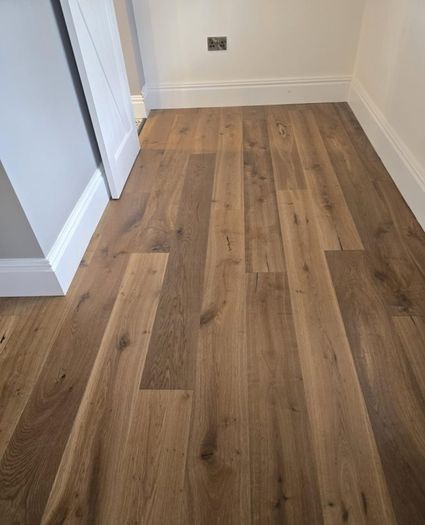 Laminated wood floor fitting