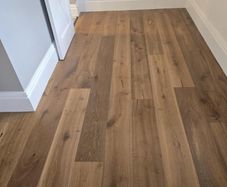 Laminated wood floor fitting