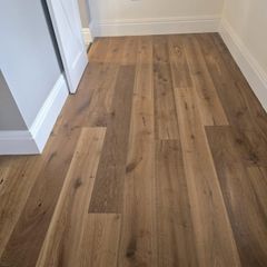 Laminated wood floor fitting
