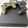 PS4 console & 2 controllers Image 3