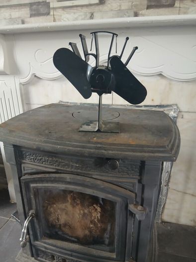 solid fuel stove heat blower and childproof fence