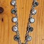 This matching silver-tone crystal necklace and bracelet set features alternating clear and black round stations with textured bezels.  SEE PHOTOS FOR SAME. Image 8