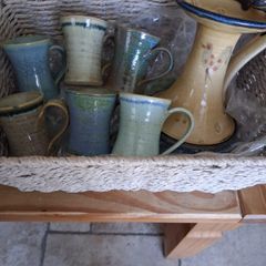 6 ceramic mugs and candleholder