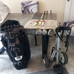 Womens Golf clubs and bag and trolley.