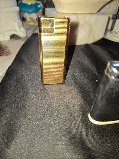 Lot of Old Lighters 5 Ronson, 1 Colibri in original box and 1 Ambassador all sold as parts or repair as I've no way of checking them, Postage Available or Collection
