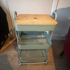 Green trolly on wheels