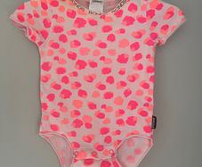 Bonds baby pink spotted all in one Size 0-3 mths EUC