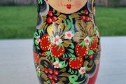 A set of five hand-painted, traditional Russian dolls