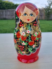 A set of five hand-painted, traditional Russian dolls