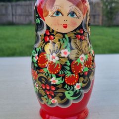 A set of five hand-painted, traditional Russian dolls