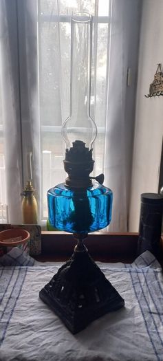 Antique Blue Glass Brass and cast iron metal large table oil lamp in very good condition and working
