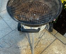 Weber Kettle Barbecue with a Chimney Starter and some coals