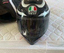 Harley Davidson leather jacket bought in the u.sa brand new never worn. Also agv helmet new also