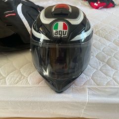 Harley Davidson leather jacket bought in the u.sa brand new never worn. Also agv helmet new also