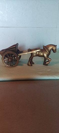 Vintage heavy brass horse and cart, weight 131.13g