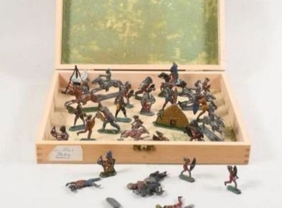 Antique stamped lead toys in carrier box