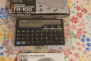vintage casio travel translator + calculator