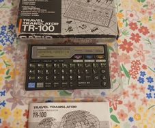 vintage casio travel translator + calculator