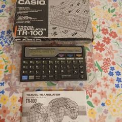 vintage casio travel translator + calculator