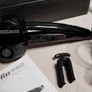 BaByliss PRO Perfect Curl styling tool, highlighting its "Auto Curl technology for creating effortless curls. Image 2