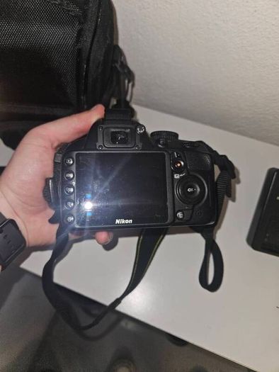 Nikon D3100 with lens