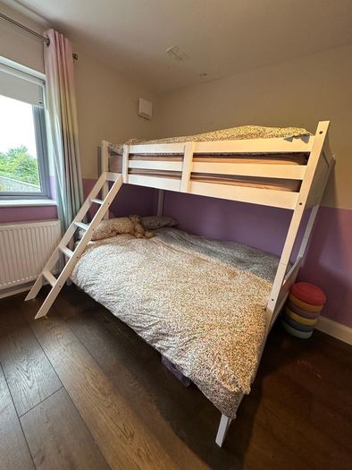 Triple bunk bed.