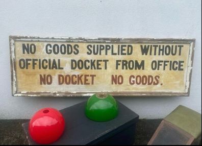 large antique hand painted sign,  Goods Supplied without official docket from office, No Docket  No Goods