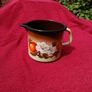 Retro Mid Century Milk pot or jug.  Enamel dark brown and orange with a floral pattern! Image 9