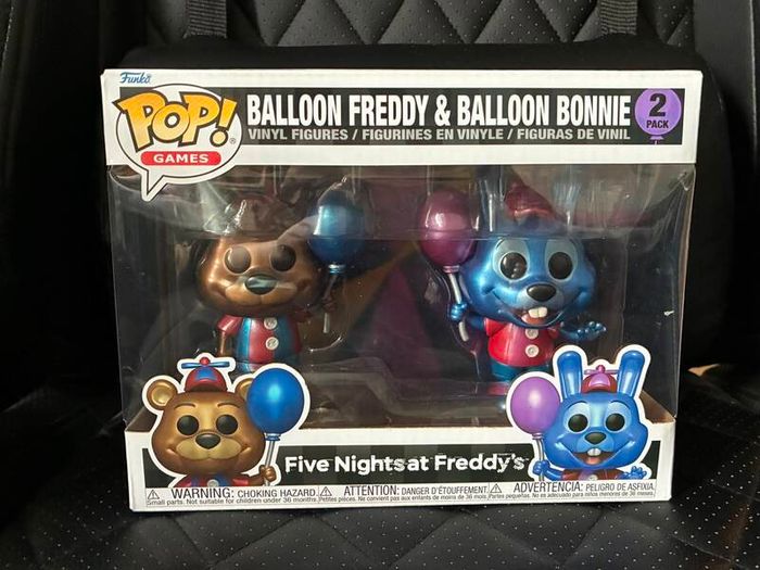 Five Nights at Freddys plushies and dragon figures