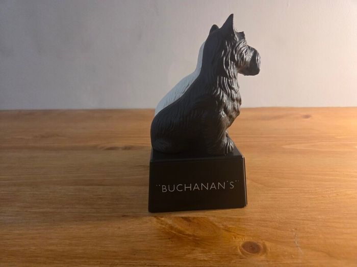Black and white whiskey statue