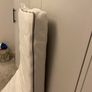 Cot mattress with sheets and protectors Image 2