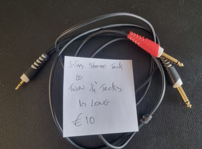 Stereo mini jack to 1/4" splitter