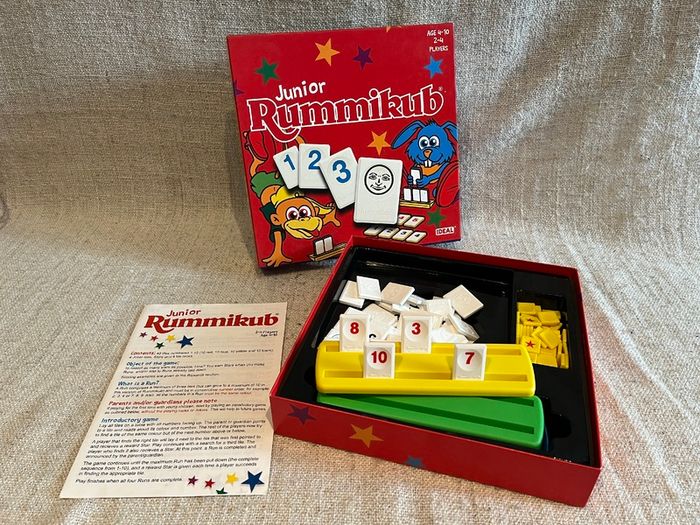 4 board games for kids: Poo Bingo, Junior Rummikub & cooperative games Outfoxed, Race to the Treasure