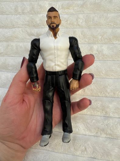 WWE Mattel Basic Series 77 Corey Graves Wrestling neck and legs are too loose Used Please see photos