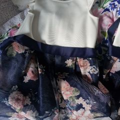 Two Lipsy London dresses. Aged 5-6yrs. Bought as flower girl dresses and only worn the once.