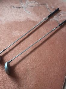 2 golf clubs