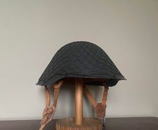 Original Cold War East German M56/76 Stahlhelm with camouflage net. NVA. Complete. Militaria