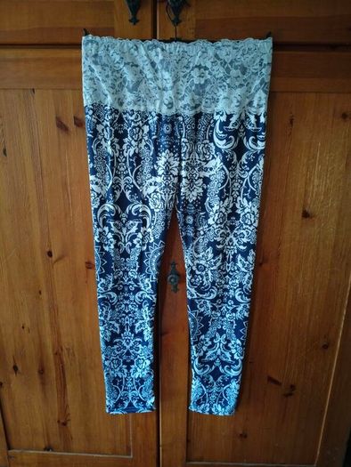 blue and white leggings with damask print with a white lace waistband. New never worn.
