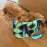 Dog stuffed animal in bag Image 4