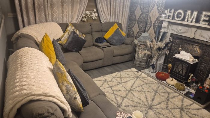 Corner sofa with recliner and 2-seater