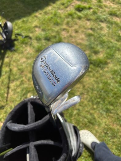 Stalemate golf bag with clubs inside