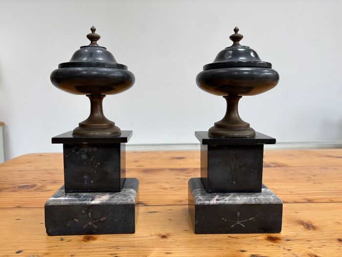 Matching pair of antique marble, slate and brass ornaments.